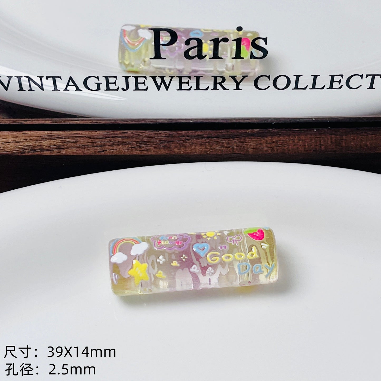 Transparent embossed double-hole cylindrical bead