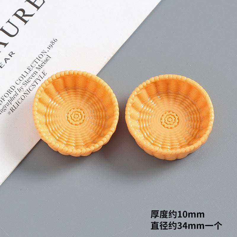 Simulated resin woven basket