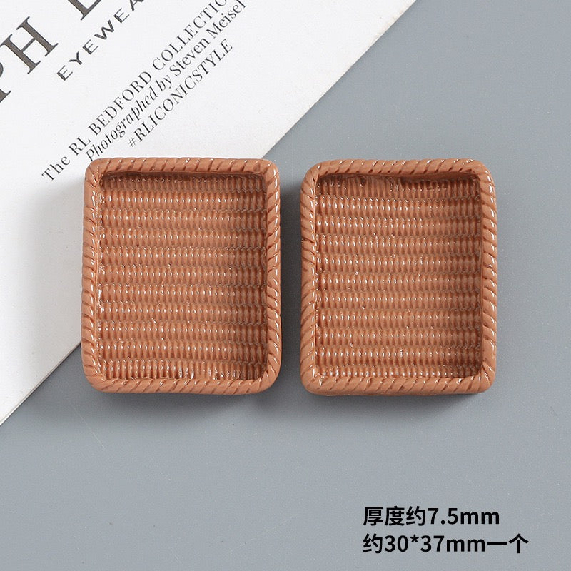 Simulated resin woven basket