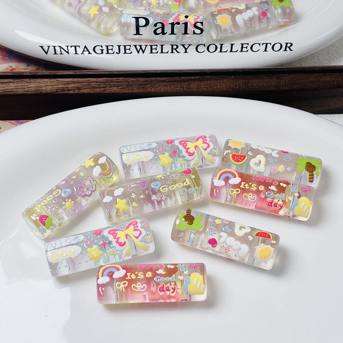 Transparent embossed double-hole cylindrical bead