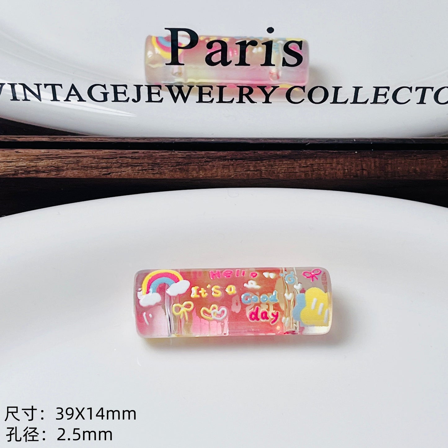 Transparent embossed double-hole cylindrical bead